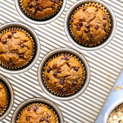 banana oatmeal muffins baked in a silver pan.
