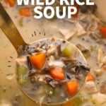 chicken wild rice soup on a ladle labeled for Pinterest.