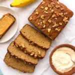 coconut flour banana bread with one slice topped with peanut butter.