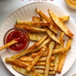 air fryer french fries on a plate labeled for Pinterest.