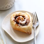 gluten-free cinnamon roll on a plate