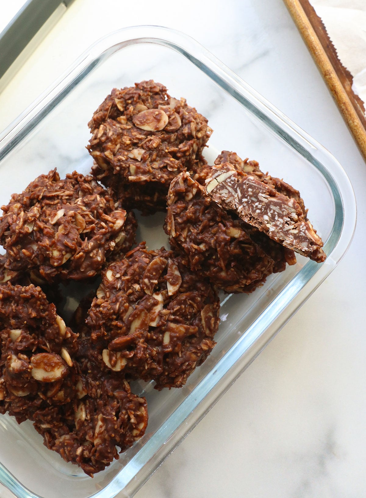 paleo no bake cookies in an airtight container.