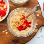 strawberries served on top of peanut butter overnight oats.
